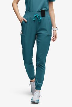 It’s amazing how popular jogger-style scrub pants have become. But why not? They’re comfortable and 100% trip-proof. And when you add 7 pockets, they’re pretty much perfect. The Easy Stretch Collection is designed with a modern look and fit. Luxurious stretch fabric keeps you comfortable all shift long, never needs ironing.. Easy Stretch Olivia Women's 7-Pocket Slim Leg Jogger Scrub Pants - Size XXS Greys Anatomy Men, Maternity Scrub Top, Med Couture Scrubs, Maternity Scrubs, Dickies Scrubs, Slim Joggers, Mens Scrubs, Scrub Life, Scrub Jackets