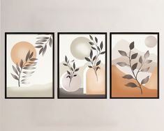 three framed art pieces with leaves on them