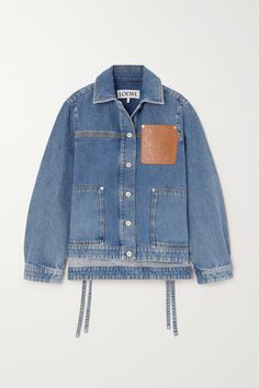 Loewe's take on the classic denim jacket features a sizable leather patch debossed with the logo and signature Anagram, so no one will mistake which house it belongs to. Cut for a slightly loose fit, it has patch pockets and ties that dangle past the step hem. Graphic Jackets, Classic Denim Jacket, Classic Wardrobe, One Clothing, 4 Months, Casual Coat, Leather Patches, Denim Outfit, Casual Jacket