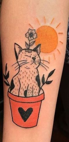 a cat sitting in a flower pot with the sun behind it and heart on its leg