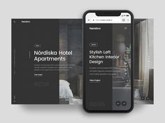 an iphone showing the hotel app on its screen and in front of it, there is a