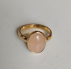 Handmade Oval Rose Gold Rings, Oval Polished Moonstone Ring Gift, Handmade Oval Crystal Ring Fine Jewelry, Handmade Oval Crystal Ring In Fine Jewelry Style, Spiritual Oval Rose Gold Jewelry, 14k Gold Jewelry With Large Oval Stone, Dainty Handmade Oval Rings, Hallmarked Oval Moonstone Ring For Gift, Adjustable Oval Hallmarked Crystal Ring