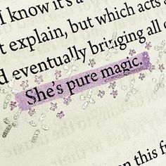 an open book with the words she's pure magic written in purple on it