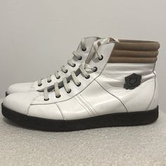 Pre-Owned Salvatore Ferragamo Men High Top Sneaker White Leather/ Taupe Suede In Great Condition (Sneakers Only) Size: Us 10 Item In Great Pre-Owned Condition, Very Slight Wear On Outside Of Heels, Minimum Creases And Shape From Wear By Previous Owner. Sold As Is And As Shown Per Above Pictures. (Sneakers Only) No Box No Dust Bags. Made In Italy White Leather High-top Sneakers With Vibram Sole, White High-top Sneakers With Stitched Sole, White Leather High-top Sneakers With Leather Sole, Classic White Sneakers With Leather Lining, White Casual Sneakers With Leather Lining, Casual White Sneakers With Leather Lining, Sporty White Leather Boots, Designer White Leather High-top Sneakers, White Calf Leather Sneakers With Leather Lining