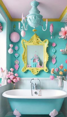 a bathroom decorated in pastel colors with pink, blue and yellow accessories on the walls