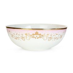 a white bowl with gold trimmings on the side and pink, yellow and white stripes