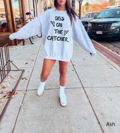 This Dibs On The Catcher sweatshirt is comfy, cozy, and oh so cute! Size up to wear as a tshirt dress or grab your regular size to wear with jeans and sneaks. However you style it, you'll love wearing it while you cheer on your favorite player!  Thanks for stopping by, we love you a latte! Gilden 1800 Brand Sweatshirts Shirts are Adult Unisex sizing and they are super soft and cozy! Rolled Sleeves in pictures are for styling purposes only Props used in photos and NOT included with purchase SIZIN Marketing Major, Marketing Student, Brand Manager, Preppy Sweatshirts, Top Clothing Brands, Gift Aesthetic, Media Planner, Coffee Sweatshirt, Look Retro