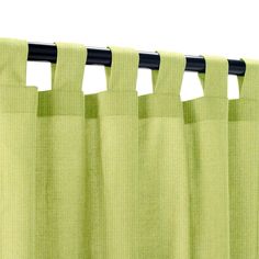 a green curtain with black rod ends hanging from it's side, in front of a white background