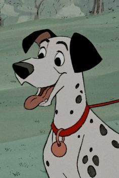 a dalmatian dog with its mouth open and tongue out