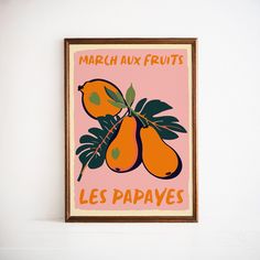 an orange poster hangs on the wall in front of a pink background with words march aux fruits les papayas