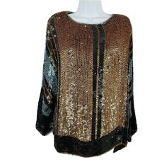 Judith Ann Creations Silk Sequins Vintage Blouse 1X.  Condition: Pre-Owned: Blouse shows some light wear, missing a handful of sequins.  See photos.  Very Cool, Nice. Length: 27.5 inches Chest (underarm to underarm): 25 inches FAST SHIPPING! FREE 30 Day No Hassle Returns (USA only)   Check out our feedback! Check out our other items! Be sure to add us to your favorites list! Item Code: 74-051620 Vintage Long Sleeve Evening Tops, Retro Long Sleeve Evening Blouse, Retro Long Sleeve Blouse For Evening, Retro Fall Party Blouse, Retro Winter Party Tops, Retro Winter Party Top, Retro Long Sleeve Party Tops, Vintage Party Tops, Accessory Ideas