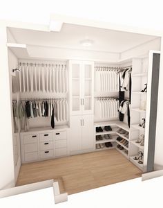 a white closet filled with lots of clothes