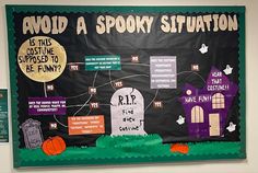 a bulletin board with halloween decorations on it