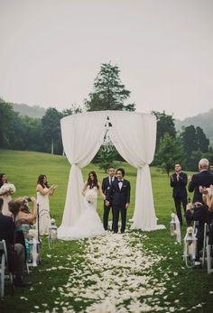 a couple walking down the aisle at their wedding