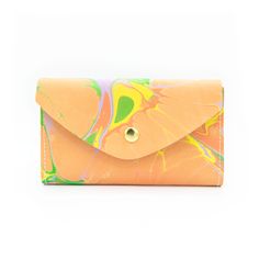 Marbled Colorful PalettesTHE wallet. Functions like a dream, holds all you need, doubles as a clutch. Available in a myriad of colorful leather options, so you can choose the one that is perfectly you. This classic design features 6 credit card slots, a compartment for organizing bills and receipts, and a back zippered coin pocket— all in a slender silhouette. The sleeve of this wallet also holds your phone, so feel free to carry it solo anytime you feel like getting dressed up. Available in sof Everyday Multicolor Bifold Wallet, Multicolor Clutch Coin Purse With Card Slots, Modern Multicolor Wallets For Everyday Use, Multicolor Card Holder For Gift, Multicolor Clutch Wallet With Card Slots, Multicolor Clutch With Card Slots For Daily Use, Multicolor Clutch Wallet For Everyday Use, Multicolor Everyday Clutch Wallet, Everyday Multicolor Clutch Wallet