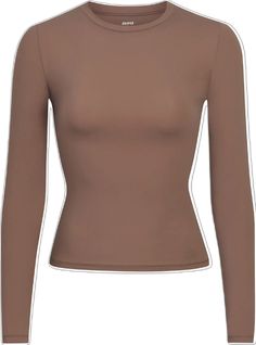 Versatile Long Sleeve T-shirt, Stretch Long Sleeve T-shirt With Thumbholes, Casual Second-skin Long Sleeve Tops, Stretch Long Sleeve T-shirt For Layering, Solid Color Long Sleeve Snug Fit Tops, Solid Color Soft Stretch Long Sleeve Tops, Solid Long Sleeve Tops With Soft Stretch, Long Sleeve Tee, Breathable Fabric