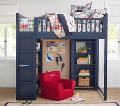 a bunk bed with a desk underneath it and a red chair in front of it