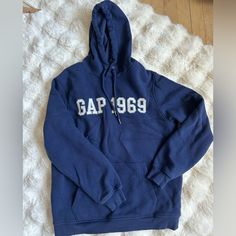 Gap Blue Hoodie- Size Small Very Cozy Inside Never Worn Or Washed Fits A Small A Little Oversized Cozy Blue Sweatshirt With Letter Print, Casual Blue Gap Outerwear, Gap Crew Neck Winter Hoodie, Gap Crew Neck Hoodie For Winter, Casual Fleece Hoodie By Gap, Gap Casual Fleece Hoodie, Casual Gap Fleece Hoodie, Gap Casual Sweatshirt With Adjustable Hood, Gap Long Sleeve Tops With Adjustable Hood