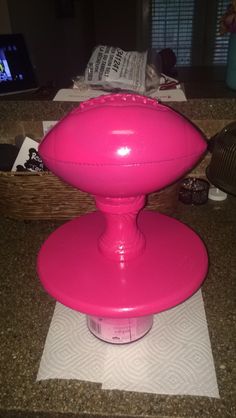 a large pink object sitting on top of a counter