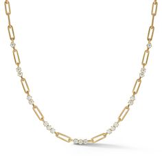 Created as Phoebe's younger sister, just as elegant but more playful. The Pia Necklace takes a contemporary twist on our signature rectangle-link chain with brilliant-cut diamonds meticulously set throughout --- creating a perfect balance of gold and diamonds. MATERIALS & MEASUREMENTS Handcrafted in 18-Karat Gold 19 x Diamonds: 1.52 Total Carat Weight Length: 18-Inch Matte Finish STYLE JT4180N Diamond Necklace With Paperclip Chain, Diamond Necklace With Paperclip Chain And Oval Links, Luxury Diamond Paperclip Chain Necklace, Yellow Gold Diamond Necklace With Paperclip Chain, Modern Diamond Necklace With Cable Chain, Modern Diamond Link Necklace, Diamond Link Chain Necklace, Modern Yellow Gold Diamond Necklace With Cable Chain, Single Cut Diamond Link Necklace