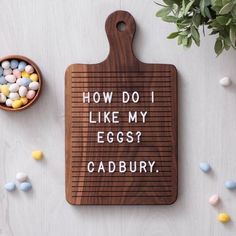 a cutting board that says how do i like my eggs? cadbury