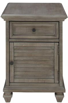 an antique style nightstand with shutters on the top and bottom drawer, in grey wood