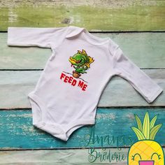 🍍I use Carter's Brand onesies, these are super soft! They are 100% cotton and run true to size. Please see the Size Chart if you have any doubts. 🍍 How to purchase: 1. Select the size you would need and click Add to Cart. 2. Include the NAME & NEED BY DATE  in the personalization section. If you're not interested in adding a name, just write N/A. 3. Double check shipping address. 4. Check out. 🍍Processing Time varies from 2-3 weeks. Larger orders might take more time. Depends on how many orde Monster Plant, Audrey 2, Baby Shower Halloween, Plant Embroidery, Embroidered Onesie, New Baby Boys, Gender Neutral Baby Clothes, Halloween Spooky, Musical Movies