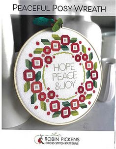 a cross stitch pattern with the words hope, peace and joy