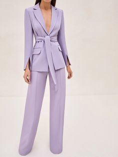 The Journey Blazer embodies sleek tailoring. Designed with peaked lapels and structured shoulders, this blazer comes with a sash belt that adjusts to synch your waist. Style with the matching Rex Pants for a sleek look. Chic Semi-formal Pantsuit With Structured Boning, Long Sleeve Structured Pantsuit For Office, Long Sleeve Pantsuit With Structured Boning For Office, Workwear Blazer Dress With Structured Boning And Suit Collar, Spring Suits With Structured Boning And Suit Collar, Spring Blazer With Notch Lapel And Belted Cuffs, Elegant Formal Outerwear With Belt, Spring Notch Lapel Blazer With Belted Cuffs, Semi-formal Pantsuit With Structured Boning And Suit Collar