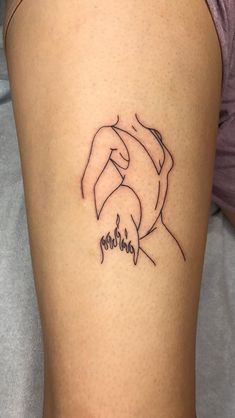 a woman's thigh with a tattoo on it that reads, mom and child