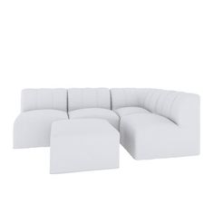 a white sectional sofa with ottoman and footstool in front of a white background