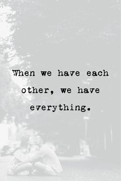 two people sitting on the ground in front of trees with a quote that reads when we have each other, we have everything