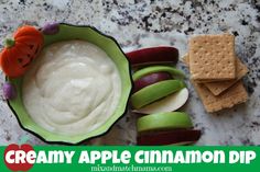 an apple cinnamon dip in a bowl with crackers