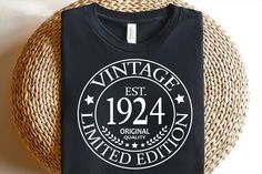 a black t - shirt that reads vintage est 1244 limited edition