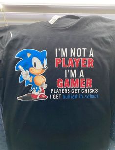 a t - shirt that says i'm not a player, i'm a gamer players get chicks