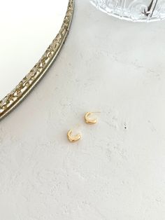 These dainty 18k gold filled huggie hoops feature a post back. They are the huggies of your dreams! Feel free to get them wet or wear them to workout, but avoid getting lotion or perfumes on the earrings to make them long lasting. If you need to clean your earring, use a mild soap and water. Each Timeless piece comes with beautiful jewelry pouch and care card. Minimum 3 pcs. per order. Jewelry Pouch, Mild Soap, Timeless Pieces, Beautiful Jewelry, Gold Filled, Lotion, Everyday Wear, 18k Gold, Long Lasting