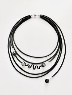 Shades of Gray Jewelry by Dagmara Costello (Rubber & Stone Jewelry) | Artful Home Modern Adjustable Single Strand Necklace, Contemporary Adjustable Black Jewelry, Grey Necklace, Grey Jewelry, Asymmetrical Necklace, Morse Code Necklace, Gray Necklace, Gray Jewelry, 3d Printed Metal