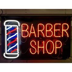 a neon sign that says barber shop