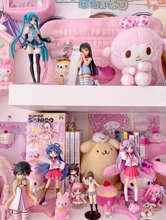 there are many dolls and toys on the shelves