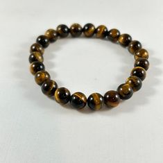 Tiger Eye Bracelet/healing Bracelet/crystal Bead - Etsy Holistic Healing Beaded Bracelets, Holistic Stretch Bracelet With 8mm Beads For Healing, Gemstone Beads Bracelet For Gift, Meditation Bracelets With Round Natural Stones, Evil Eye Bracelet With Round Gemstone Beads, Evil Eye Bracelet With Gemstone Beads As Gift, Gift Evil Eye Bracelet With Gemstone Beads, Casual 8mm Beads Crystal Bracelet Gift, Spiritual Gemstone Beads Bracelet