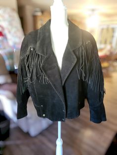 Vintage Rock Creek Black fringed suede jacket boho western sz L Needs a good cleaning otherwise great vintage condition.  Measures:  Shoulders: 21" Sleeves: 23" Chest: 23" Waist" 22" Shoulder to Hem: 23" Recycled shipping material used when available. Fall Leather Jacket With Fringe For Rodeo, Leather Jacket With Fringe For Rodeo In Fall, Bohemian Winter Leather Jacket With Fringe, Fall Festival Leather Jacket With Fringe, Vintage Winter Leather Jacket With Fringe, Vintage Leather Jacket With Fringe For Winter, Vintage Fringe Leather Jacket For Winter, Western Leather Jacket With Fringe For Winter, Long Sleeve Leather Jacket With Fringe For Rodeo