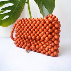 Natural Beaded Bag As Gift, Natural Beaded Bag Perfect For Gifts, Natural Beaded Bags Perfect For Gifts, Brown Handheld Handmade Evening Bag, Handmade Brown Handheld Evening Bag, Everyday Rectangular Beaded Clutch, Unique Handmade Evening Bags, Natural Rectangular Bag With Wooden Beads, Rectangular Natural Bag With Wooden Beads