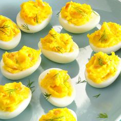 several deviled eggs are arranged on a plate