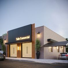 an image of a commercial building with cars parked outside