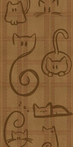 an image of cats drawn on brown paper