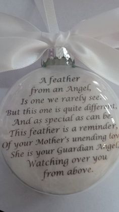 a glass ornament with a poem on it