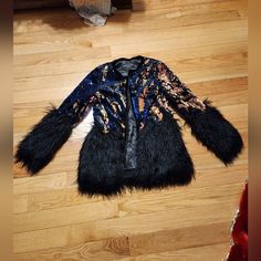 Fits True To Size. Zip Up Entry & Pockets. I Also Have A Silver/Gray Version Of This Coat Listed In A Size Medium. Faux Fur, Velvet Trimmed, And The Prettiest Sequins. They Are The Kind That Will Change Color When You Run Your Hand Over Them. The Fur Is Black, And The Sequins Are Blues, Copper- Ish & Black Color. This A Show Stopper For Sure! Long Sleeve Sequined Outerwear For Fall, Winter Evening Outerwear With Sequins, Winter Evening Outerwear With Long Sleeves, Winter Evening Long Sleeve Outerwear, Black Sequined Outerwear For Fall, Winter Evening Long-sleeve Outerwear, Faux Mink Coat, Long Vest Jacket, Cropped Faux Fur Coat