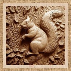 a carving of a squirrel in the woods