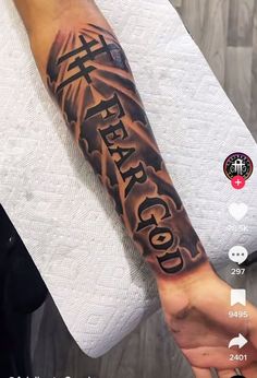 a person with a tattoo on their arm