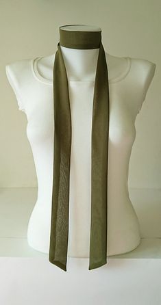 This olive green skinny scarf is made of an beautiful crepe chiffon fabric. It is sewn with a double layer, no raw edges or open seams. It has angled ends. You can wrap skinny scarf around your neck in one of many different ways. It can be use as a headband and belt also. Details: ♥ The skinny scarf has been sewn in double layer, no raw edges or open seams. ♥ Material: Crepe chiffon fabric  ♥ Color: Olive green ♥ Measurements; ~ Length: 63 inches  ~ Width: 1.5 inches  ♥ Care: Hand wash cold and Ways To Wrap A Scarf, Neck Tie Women, Scarf Neck Tie, Scarf Outfits, Chiffon Bow, Scarf Neck